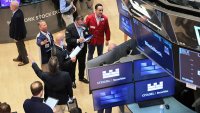 Dow напредна с над 500 пункта, подкрепен от отчети и поевтиняването на петрола