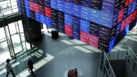 Последната борсова сесия за седмицата оцвети азиатските индекси в зелено